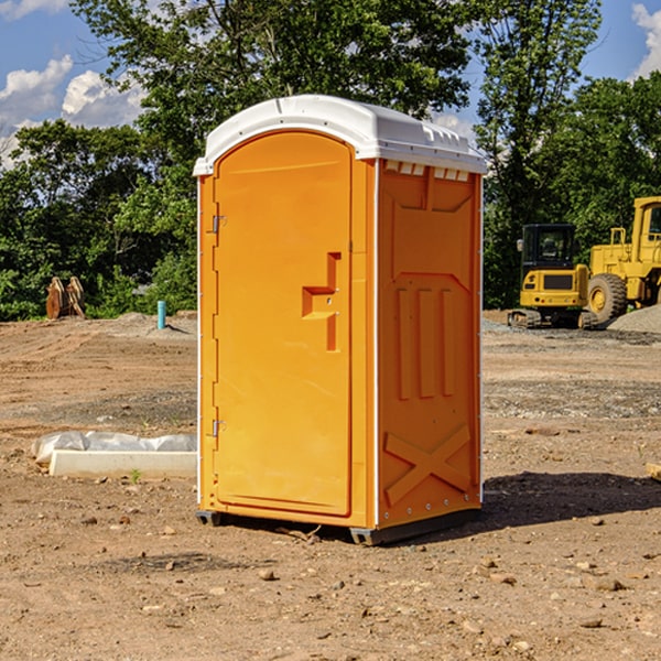 how often are the porta potties cleaned and serviced during a rental period in Aspers